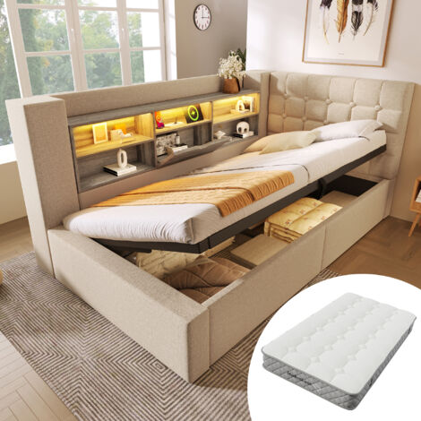 Lit individuel 90x200 cm avec éclairage LED et compartiments de rangement hydrauliques. Structure en L avec rangements latéraux, repose-pieds en bois, revêtement en lin. Avec matelas. (1/5)
