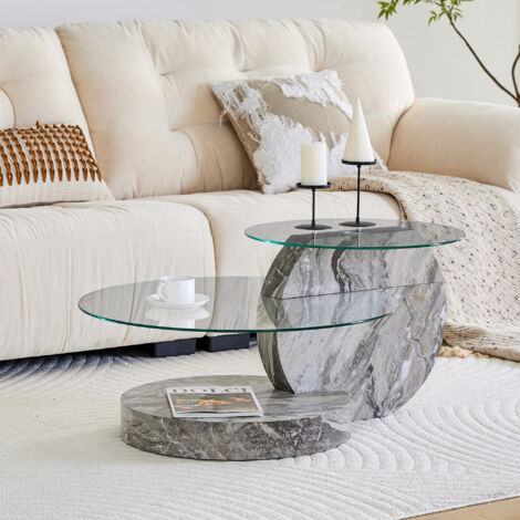 Table de salon moderne et minimaliste, fabriquée en verre sécuritaire. Deux étages. Design arrondi en marbre. Structure en MDF. Colleurs grisâtre. Disponible dans diverses couleurs. (1/5)