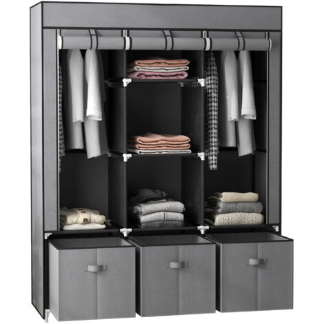Ce meuble de rangement pliable en tissu comprend 5 étagères, 2 barres de suspension et 3 tiroirs en tissu. Ses dimensions sont de 125 cm (L) x 43 cm (l) x 162,5 cm (H). (1/5)