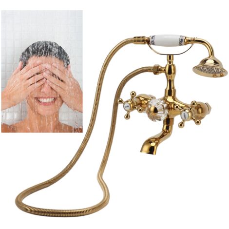 Conjunto de ducha de mano de estilo vintage antiguo con manija en cruz de cobre color dorado y montaje en pared para baños. (1/5)