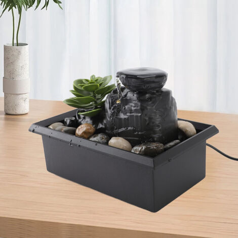 Fuente de mesa USB con iluminación LED amarilla y piedras decorativas: fuente decorativa en cascada para sala de estar, oficina o mesa. (1/5)