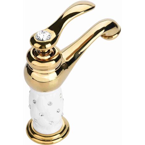 Grifo monomando para lavabo, fabricado en cobre macizo con acabado y decoración en oro. (1/5)