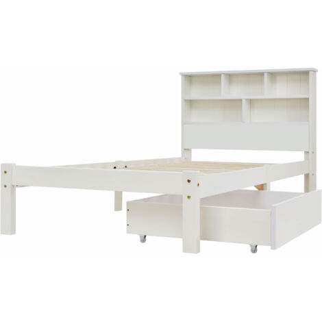 Lit en bois massif, avec des tiroirs et un sommier en planches. Il y a aussi un rayonnage pour les livres. Lit adapté aux jeunes et aux adultes. dimensions : 90x200 cm. Couleur blanche. (1/5)
