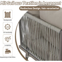 Set de meubles de jardin en fer. Set de meubles de jardin fait de fil gris. Set de meubles de jardin en forme de L. Set de meubles de jardin en fil gris, avec des coussins pour s’asseoir. 2 canapés et