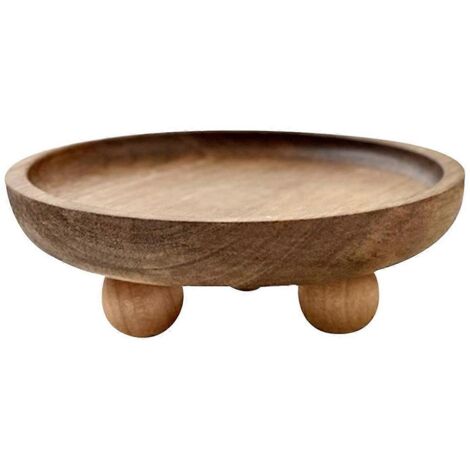 Plateau rond en bois pour gâteaux et desserts, orné de décorations d'aromathérapie. (1/5)