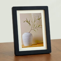 7-inch wooden photo frame, can be hung vertically or horizontally, suitable for photos 12.7x17.8 cm and smaller. A beautiful gift, suitable for desktops, wall hangings, and other occasions - Black.
