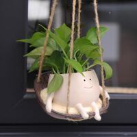 Hanging swing chair-style flower pot, smiley face design, suitable for both indoor and outdoor planting. Cute design, perfect for succulents, string of pearls, etc. A unique gift for Mother's Day, bir