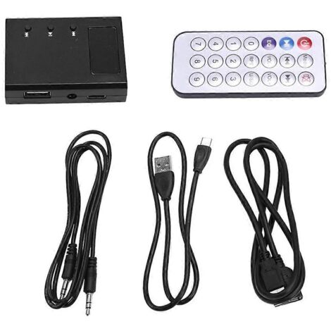 Lecteur CD portable avec décodeur auxiliaire pour voiture et adaptateur de conversion.
