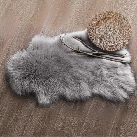 Tapis en fausse fourrure synthétique effet peau de mouton, doux et moelleux, imitant la laine véritable. (1/5)