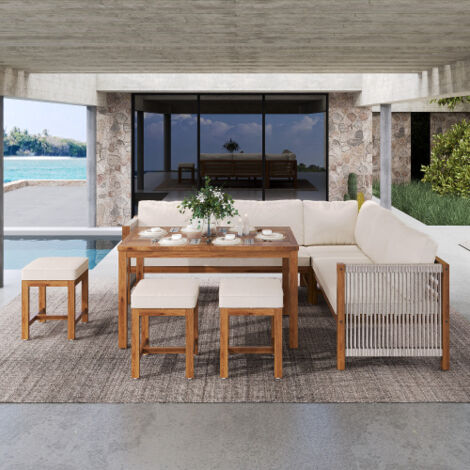 Ensemble salon de jardin en polyrotin 7-8 places, canapé d’angle + 3 bancs + table en acacia, coussins beige couleur naturelle (1/5)