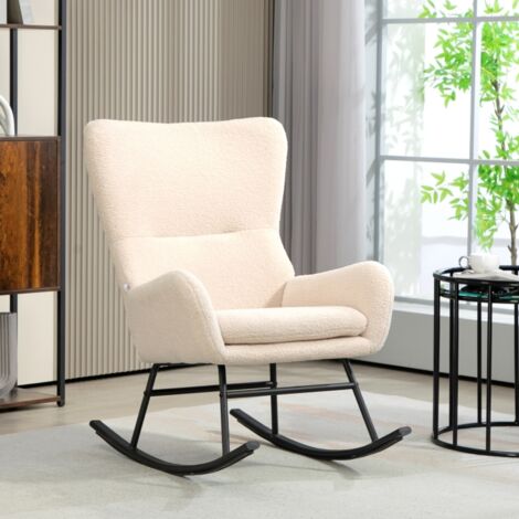 Fauteuil à bascule avec une assise de 10 cm d'épaisseur, pieds en acier courbés, coloris beige et noir. (1/5)