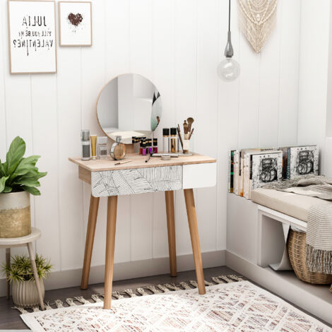 Petite coiffeuse avec miroir circulaire pour optimiser une petite chambre