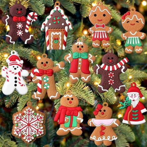 Un conjunto de 12 adornos navideños: un adorable muñeco de nieve, un Papá Noel y una casita de galletas.
