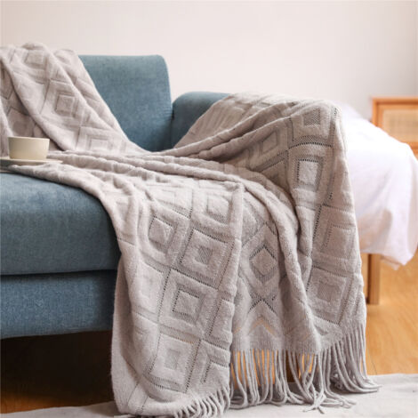 Manta de punto con flecos y pompones, color liso, ligera y suave, funda decorativa para sofá, cama o banco, 230 x 130 cm, gris claro.