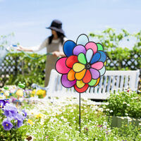 Cercle de jardin Un moulin à vent avec des fleurs - 150x150 cm - Affiche de  jardin