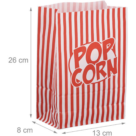 Salted Popcorn Spilling From Red White Striped Cardboard Box. Snack Motion, Cinema, Movie Night Concept Tasty Crunchy Food Image384824343