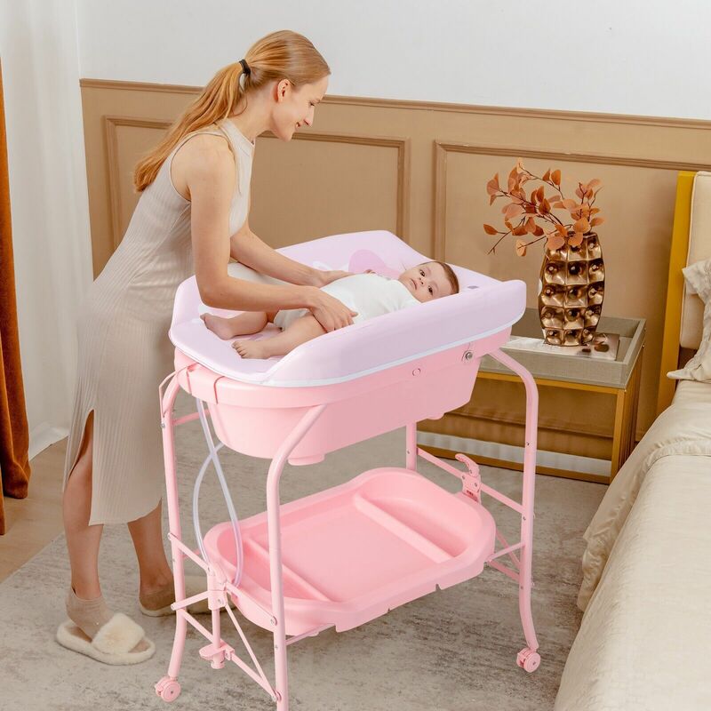 Pink crib with changing table on sale