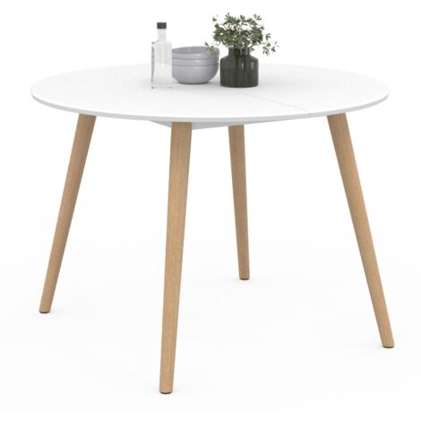 Idmarket – Table à manger ronde 110 cm – 4 places – Plateau MDF blanc – Pieds en bois biseautés – Design scandinave pour petits espaces