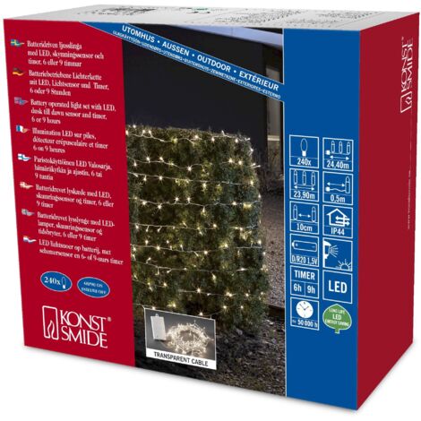 Konstsmide 3730-103 - Catena luminosa LED con interruttore on/off e sensore luminoso, timer per 6 e 9 ore, adatta a esterni (IP44), 240 diodi a luce bianca calda, funzionamento a batteria, con cavo tr (1/4)