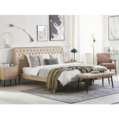 Banco para dormitorio tapizado en piel sintética beige con patas