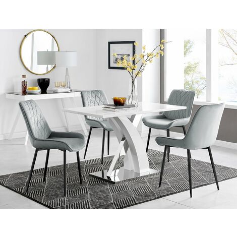 white farm table with black chairs