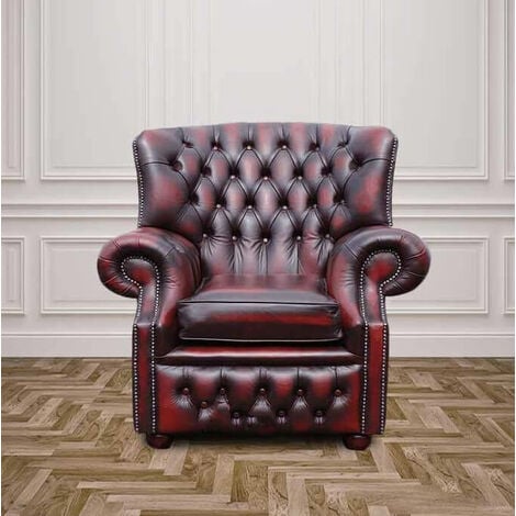 High back store winged armchair