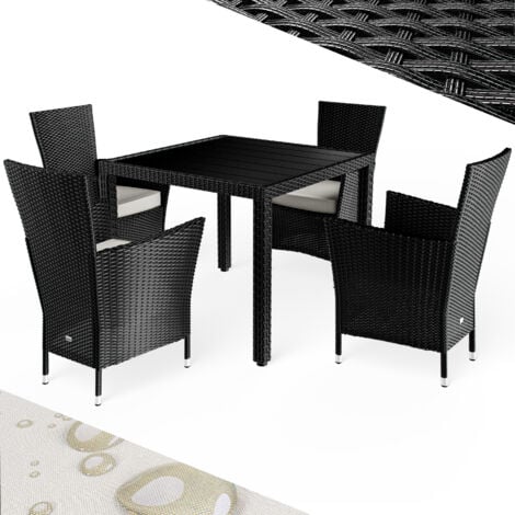 CASARIA® 4+1 Poly Rattan Outdoor Dining Furniture Set  4 Stackable Armchairs with Cushions  90x90cm Dining Table with WPC Top  Weatherproof Outdoor Patio Seating Group  Black