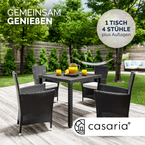 CASARIA® 4+1 Poly Rattan Outdoor Dining Furniture Set  4 Stackable Armchairs with Cushions  90x90cm Dining Table with WPC Top  Weatherproof Outdoor Patio Seating Group  Black