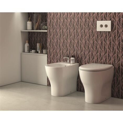 Sanitari Grace filomuro  senza brida scarico traslato cm. 52x36