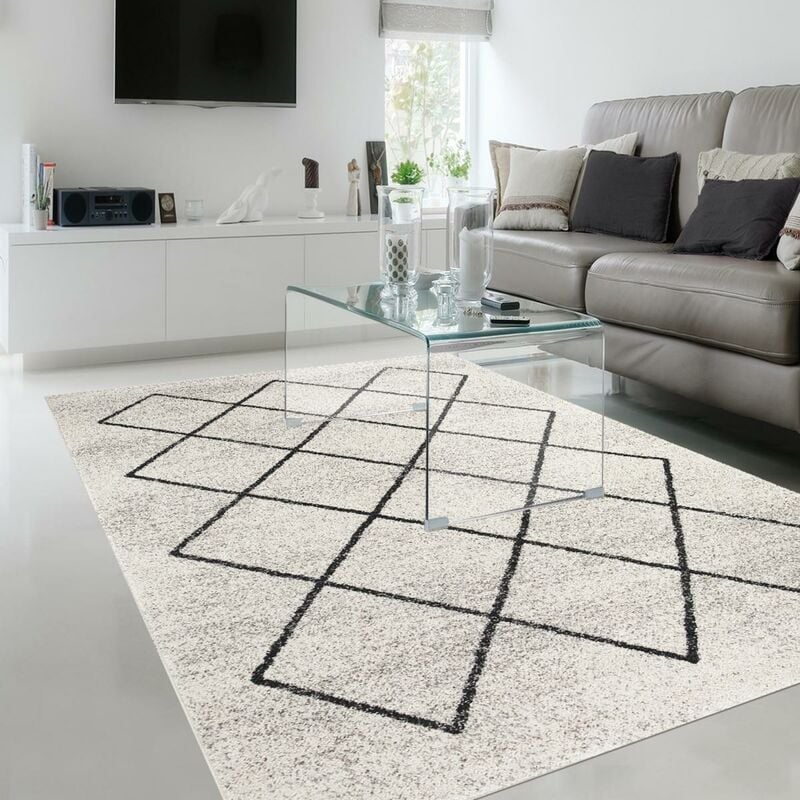 

Alfombra de diseño de Balania hecha de polipropileno gris. - Ecru