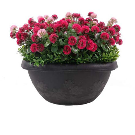Jardinière artificielle de fleurs roses avec son pot rond