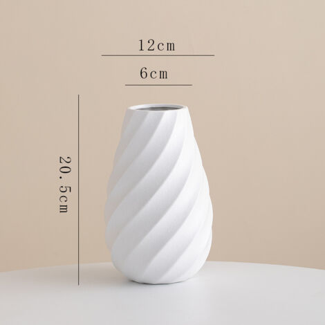 Jarrón de cerámica blanca decorado con un patrón de espiral texturizado, perfecto para exhibir flores secas y juncos - 20 cm.