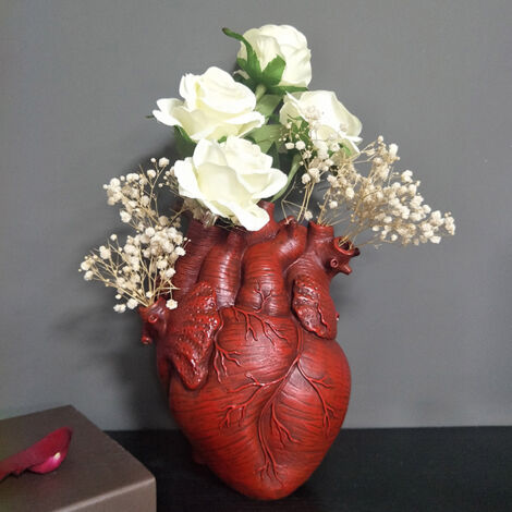 Jarrón decorativo en forma de corazón, fabricado en resina con base lastrada – Blanco o rojo – Dimensiones: 19 x 13 x 24,3 cm – ManoMano – 1 jarrón incluido