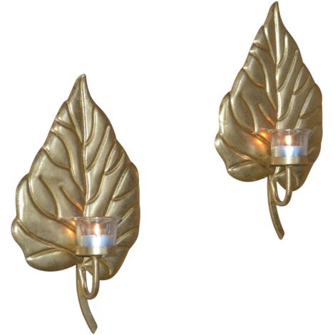 Juego de 2 portavelas de pared en metal dorado. Diseño refinado con cristal cilíndrico. Altura 33 cm. DEC050038
