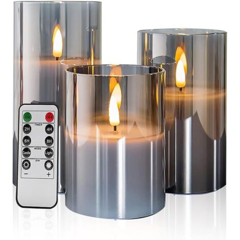 Juego de 3 velas parpadeantes sin llama de vidrio gris con control remoto, mecha móvil, funciona con pilas y luz cálida realista.