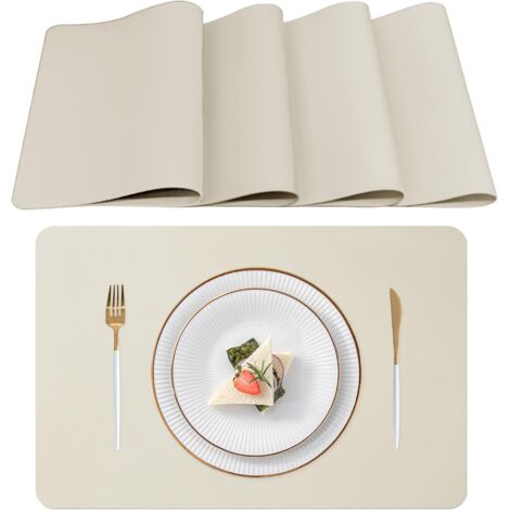 Juego de 4 manteles individuales lavables de piel sintética, de 43 x 30 cm, resistentes al calor y antideslizantes, aptos para mesas de cocina y comedor, color beige.