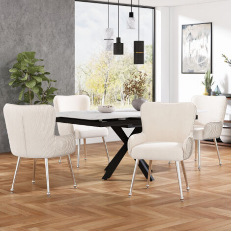 Juego de 4 sillas de comedor de terciopelo, con patas y reposabrazos de metal plateado, color beige.