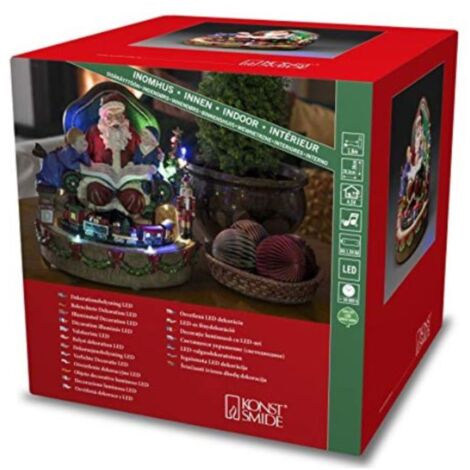 KONSTSMIDE 4215-000 LED Weihnachtsmann mit Kindern und Zug, wählbare Energiefunktion und 8 klassischen Weihnachtsliedern, 12 bunte Dioden, 4.5V Innentrafo/batteriebetrieben, Innen