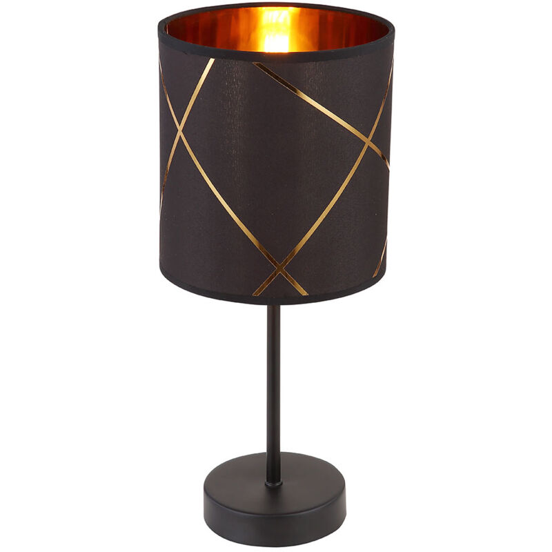 La lumière de cette belle lampe de table se reflète merveilleusement à travers l'acrylique de couleur or attaché à l'intérieur de l'abat-jour.