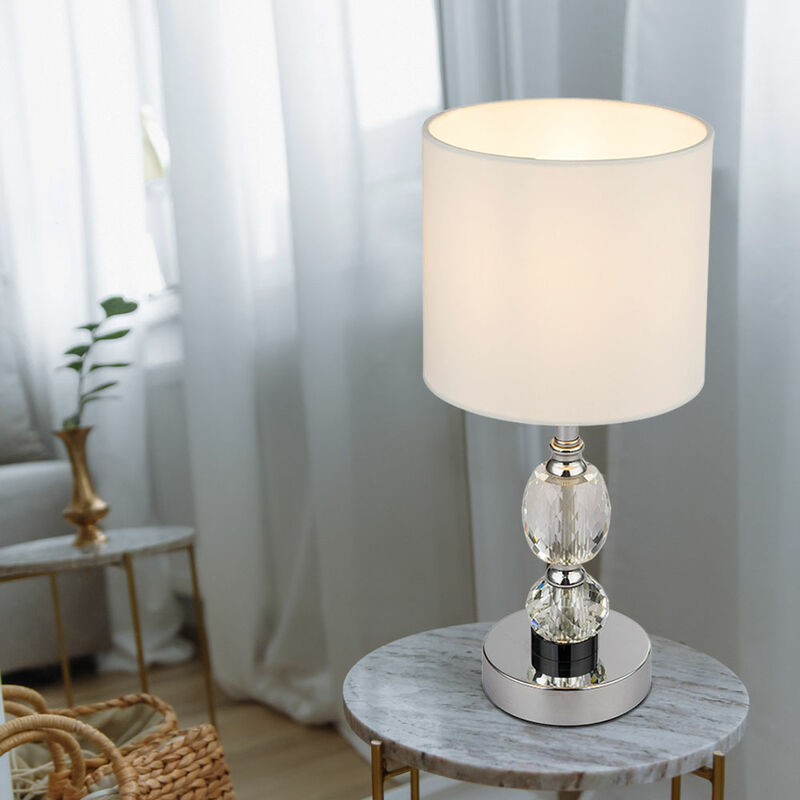 Image of Lampada da comodino, vetro cristallo, lampada da tavolo, base in vetro, lampada da tavolo, soggiorno, cromo, tessuto bianco, 1x E14, DxH 15x34 cm