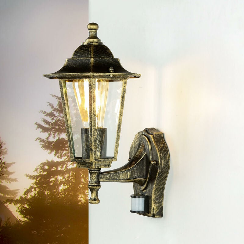 Image of Licht-erlebnisse - Lampada da parete esterna dal design rustico a lanterna con rilevatore di movimento color oro antico IP44 - Oro antico