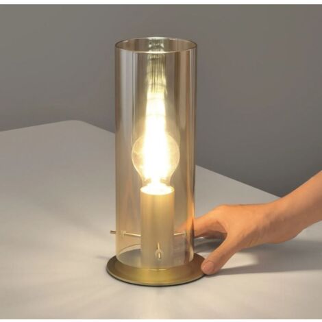 "Lampada da tavolo MAGIC in metallo oro e diffusore in vetro ambrato"