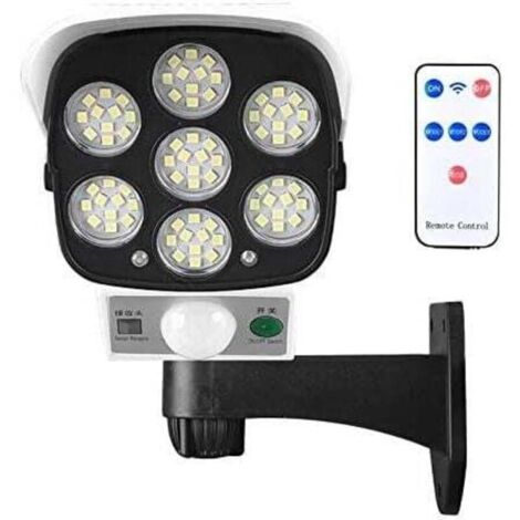 Lampe solaire d'extérieur avec détecteur de mouvement sans fil et caméra de sécurité factice IP66 étanche 77 LED lampe murale spot pour cour, jardin, terrasse, garage, allée..DEBUNS