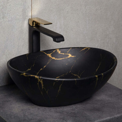 Lavabo da appoggio ovale in ceramica TANDILA nero opaco marmorizzato con venature dorate.
