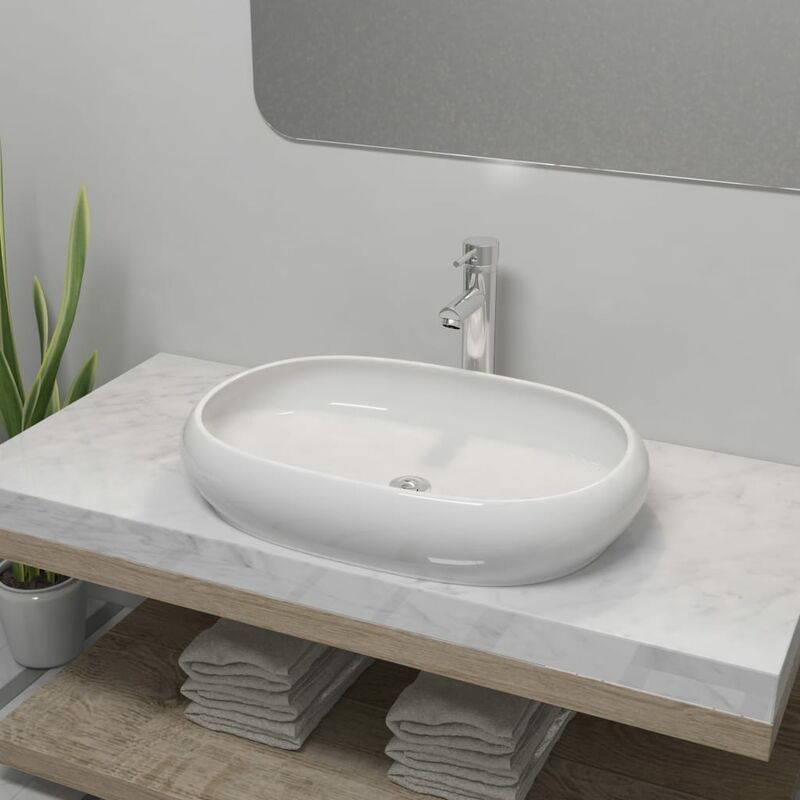 

Lavabo de baño ovalado con grifo mezclador cerámica blanco