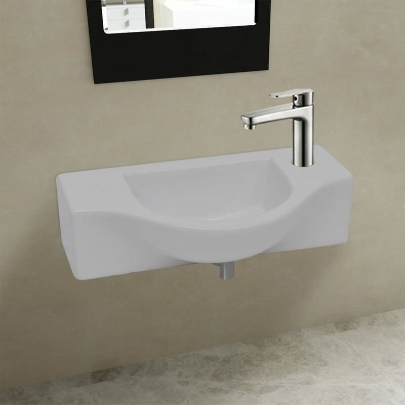 

Lavabo de cerámica blanco con agujero para grifo