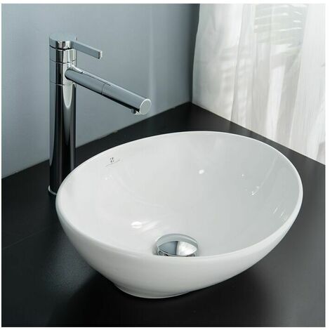 Lavabo ovale da appoggio in ceramica per bagno moderno ovale bianco con tappo sifone per lavaggio a mano di fascia alta