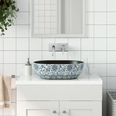 Lavabo sobre encimera ovalado cerámica negro y azul 47x33x13 cm