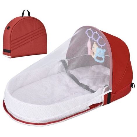 Lit de voyage pliable pour bébé avec moustiquaire et auvent, facile à transporter, parfait pour les voyages en famille.