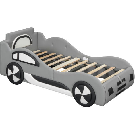 Lit enfant en forme de voiture de sport, lit en tissu rembourré à motifs de dessins animés, cadre de lit simple amusant pour garçons.